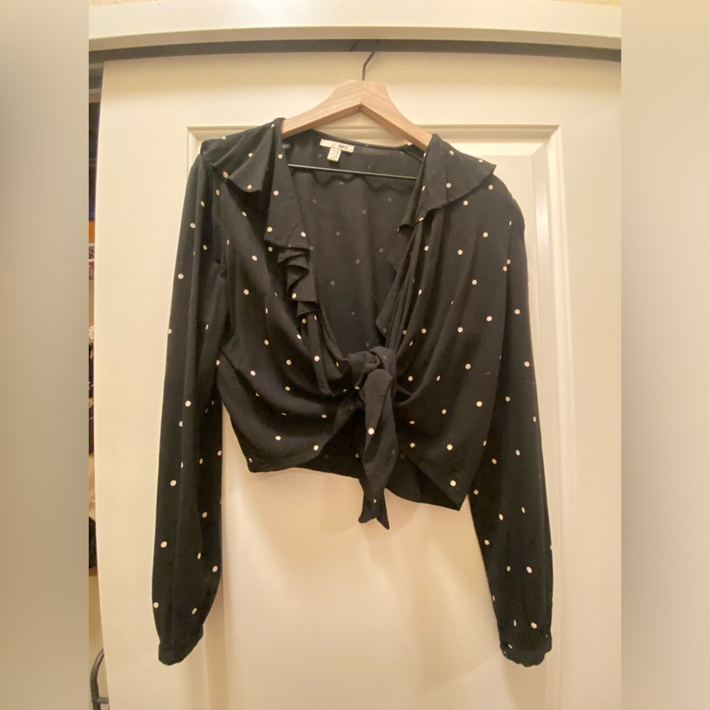 Black ruffled front tie too with white polka dots